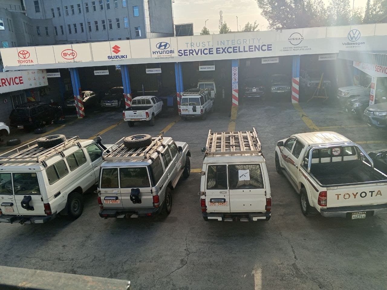AFS multi-brand service bays with Toyota, BYD, Suzuki, Hyundai, Nissan, and Volkswagen