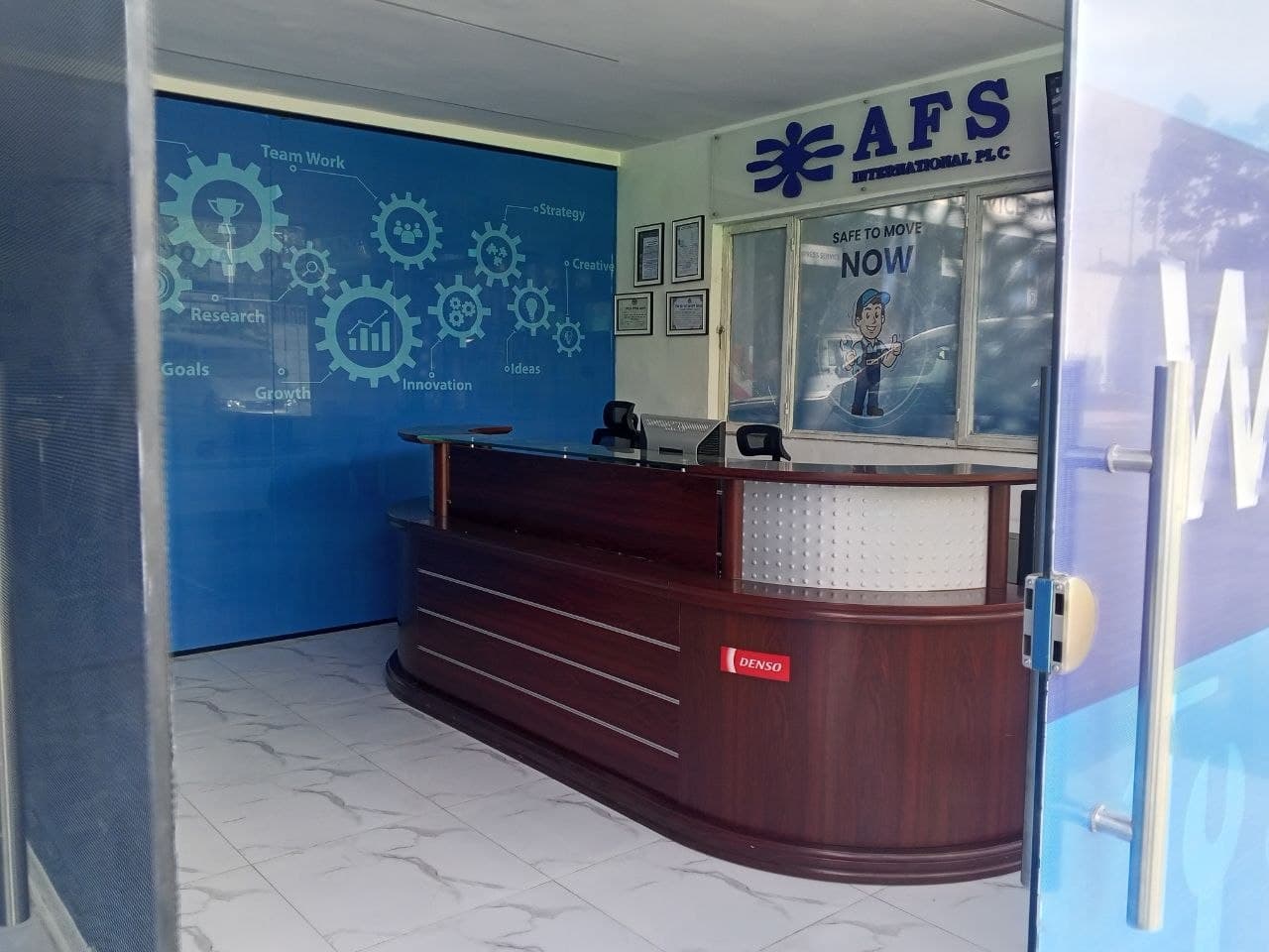 AFS International PLC reception desk and branded office interior