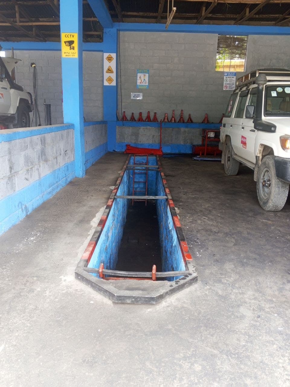 Vehicle inspection pit inside the AFS workshop
